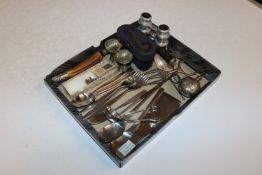 A box containing white metal toddy ladle, a pair o