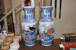 A pair of Oriental decorated vases