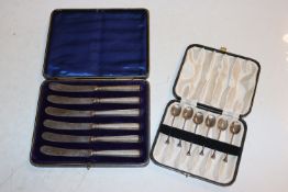A cased set of six silver coffee spoons and a case