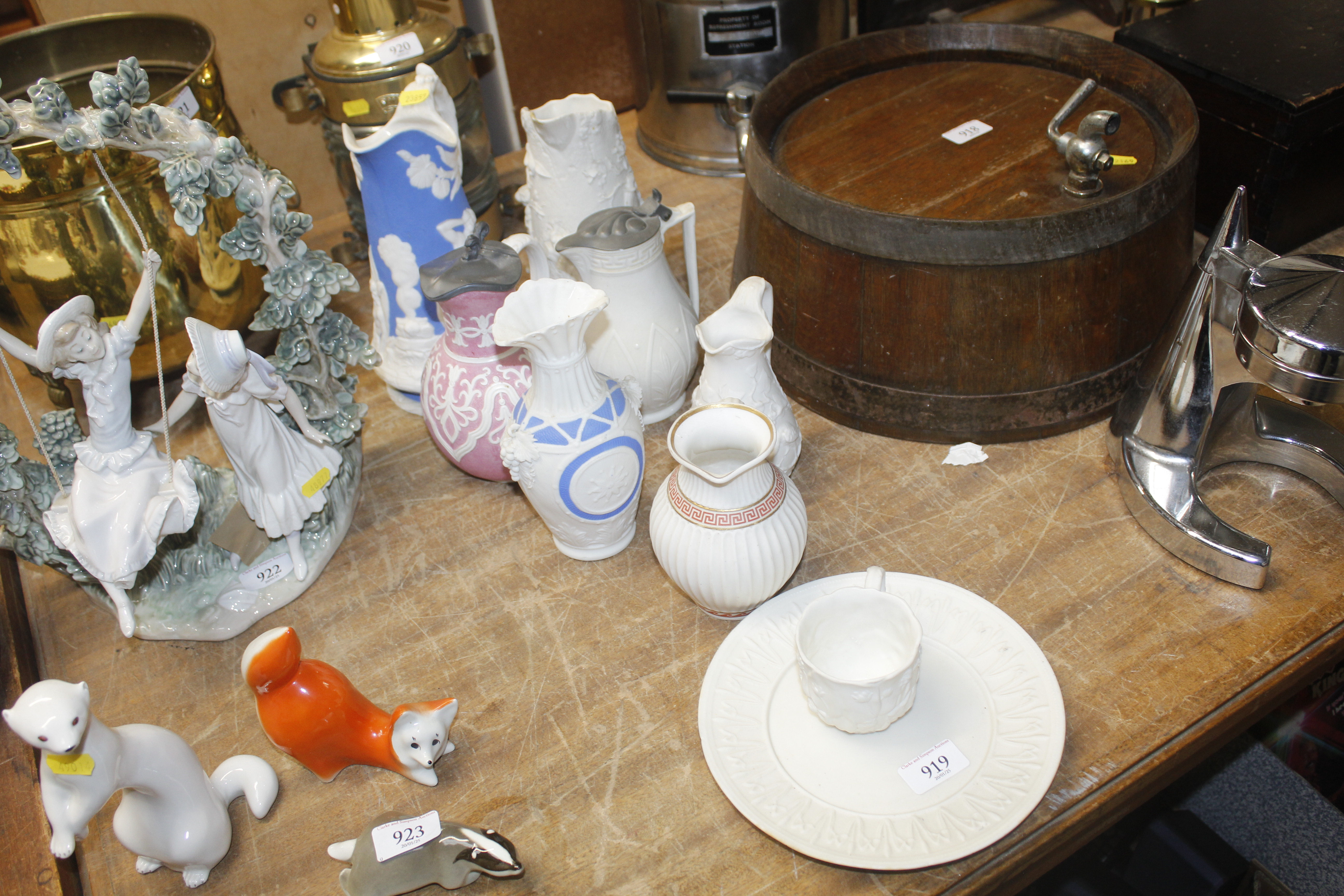 A quantity of Clarion Ware jugs, two having pewter