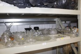 A collection of various table glass ware