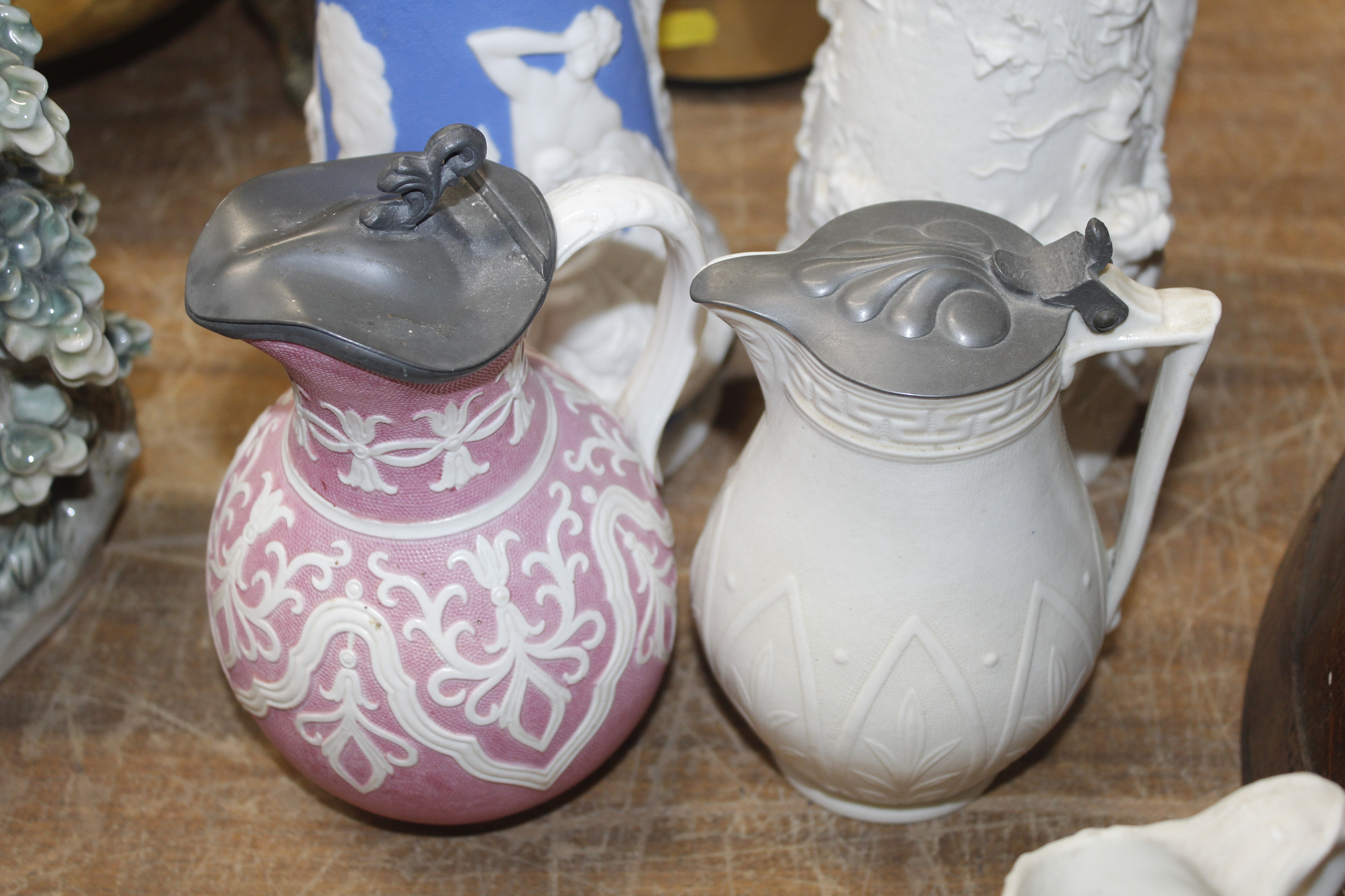A quantity of Clarion Ware jugs, two having pewter - Image 9 of 14