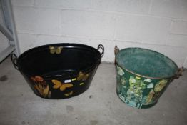 A decoupage galvanised bath and a decoupage pail