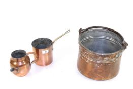 A small coppered bucket with metal swing handle, a small coppered pot with pouring spout and a