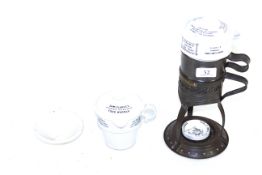 A Clarkes ceramic very early vintage food warmer with a separate spare food warmer