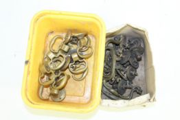 Two boxes of brass furniture fittings