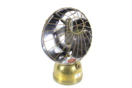 A Bialladin bowl heater with brass base