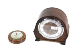 A 1930's Smiths mantel clock and a small circular barometer