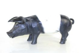A butcher's advertising shop pig