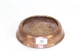 A copper and cast iron dogs drinking / feeding bowl