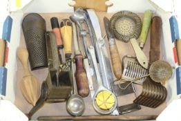 A tray of miscellaneous kitchen tools