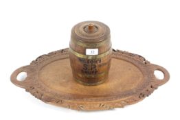 An unusual small coopered barrel with lid, named to 
