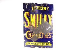 An enamel sign on rolled iron base for 
