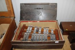 A Glockenspiel contained in a wooden case AF