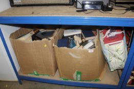 Two boxes and a bag of various books