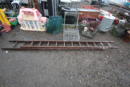 A wooden extending ladder