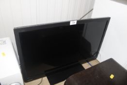 A Toshiba television lacking remote control