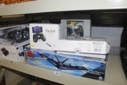 A Parrot Mambo mini drone, Parrot fly pad, a remot