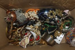 A box and contents of various costume jewellery to
