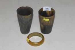 Two horn beakers, together with a bangle