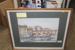 A frame and glazed water colour study of a street