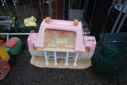 A Little Tykes outdoor doll's playhouse