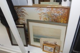 A watercolour study of a seascape, indistinctly signed; an oil on board study of a landscape