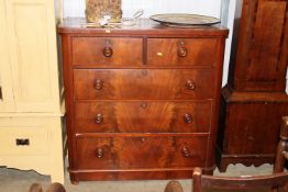 A Victorian mahogany chest fitted two short over three long drawers