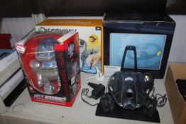 A Rovio mobile webcam, a Discovery robot arm and a boxed robot