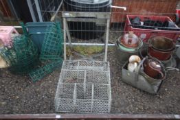 A wire metal display stand and a metal a-frame mar