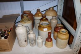 A quantity of stoneware jars, one relating to Ipswich