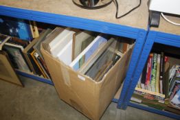 A box containing various pictures and prints to include Ben Bullock, oil on board study of a boat