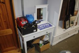 A white dressing table fitted two drawers together with a mirror