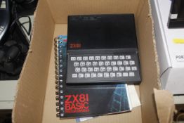 A Sinclair ZX 81 together with various manuals