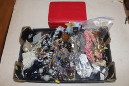 A box and contents of various costume jewellery, together with a cantilever jewellery box and