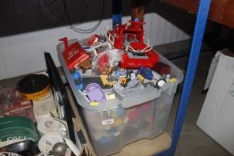 A box containing various Playmobile items