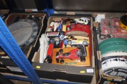 A box containing Diecast and other vehicles, a Sta