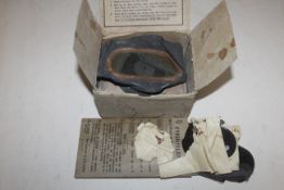 A gas mask and eye shields