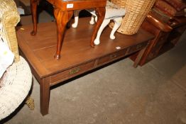 A campaign style coffee table