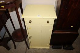 A yellow painted side cupboard fitted single drawe