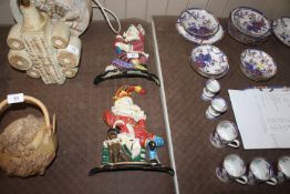 A pair of Punch and Judy doorstops