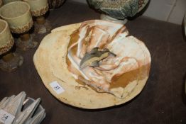 A Bernard Rooke pottery dish decorated with a Dolp
