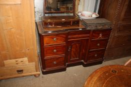 A mahogany leather topped writing desk