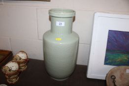 A Chinese celadon vase base drilled