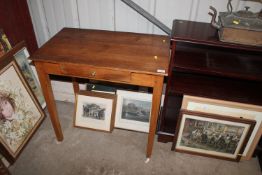 A pine side table fitted single drawer raised on s