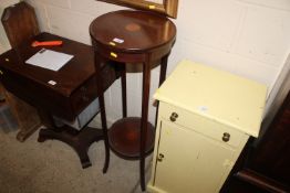 An Edwardian mahogany plant stand