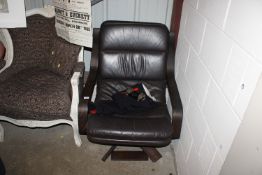 A mid century Danish leather swivel armchair AF