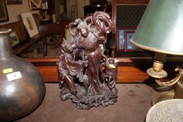 A Chinese carved wooden figure group