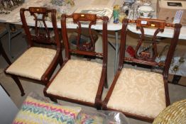 Three harp back mahogany upholstered dining chairs