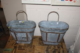A pair of galvanised hanging planters